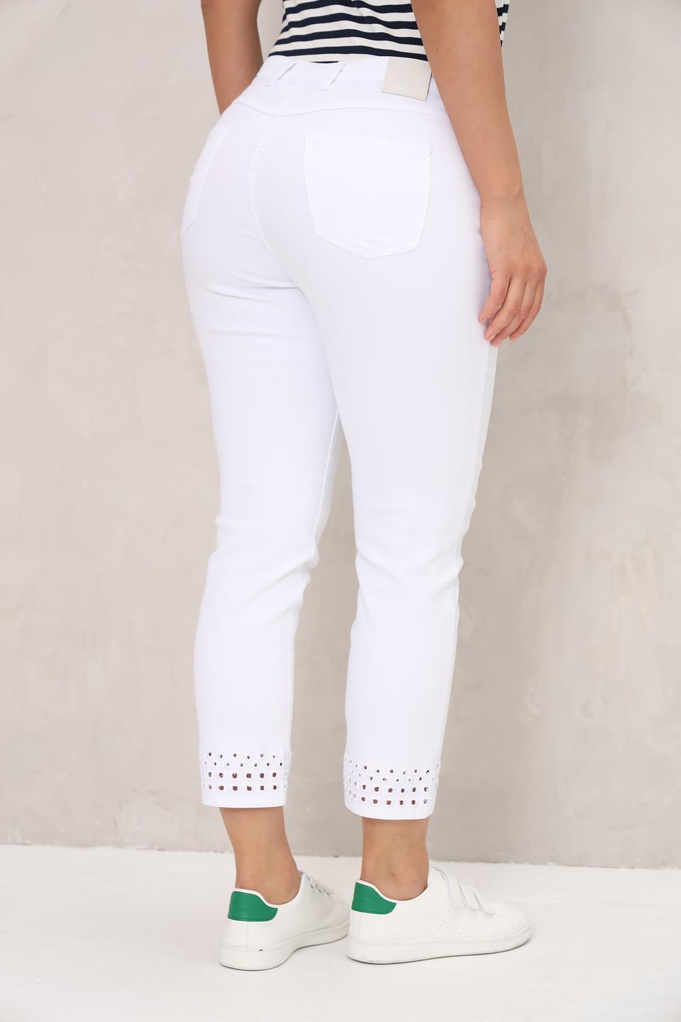 Джинсы Toni collection с перфорацией белые