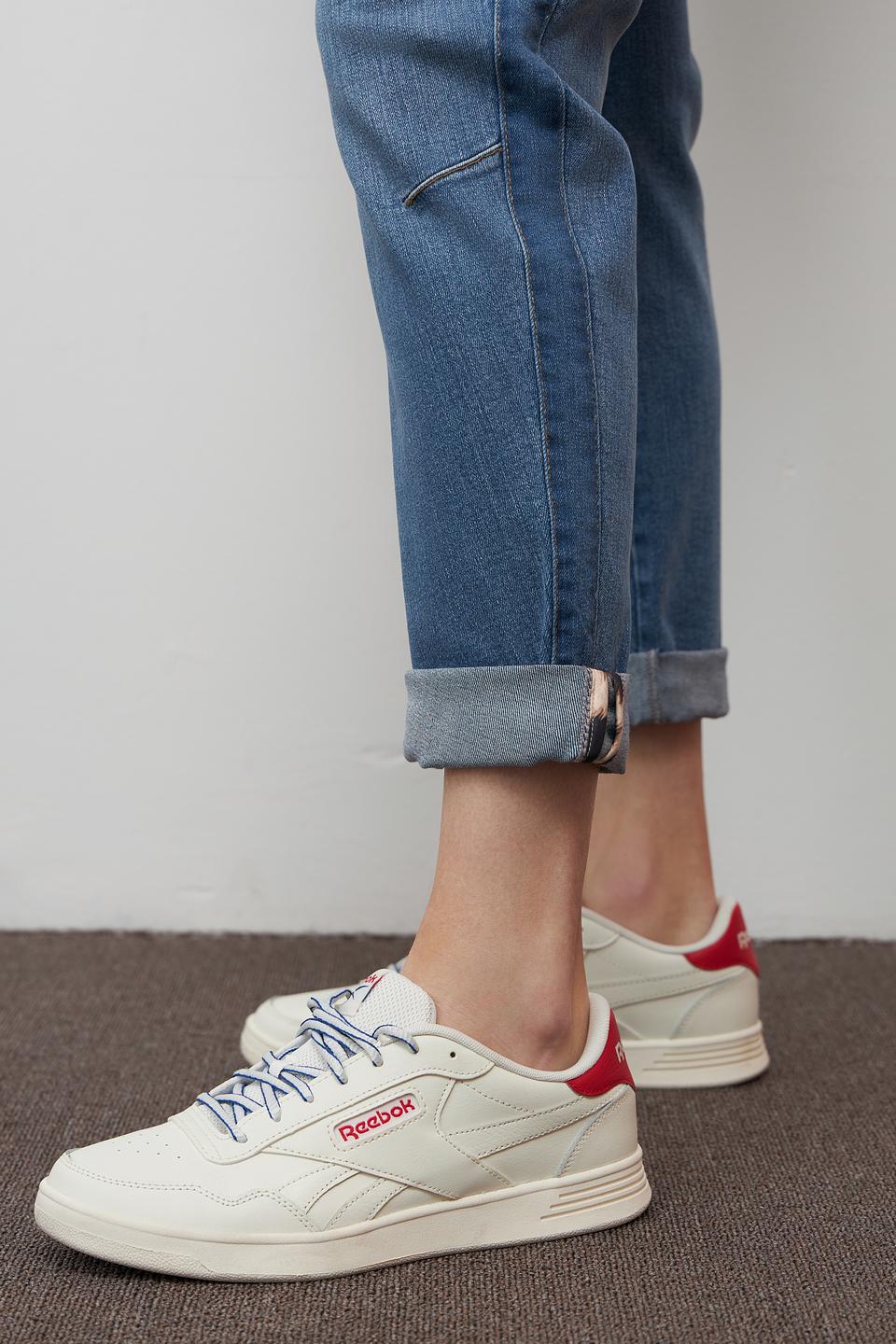 Джинсы Oui с потертостями голубые