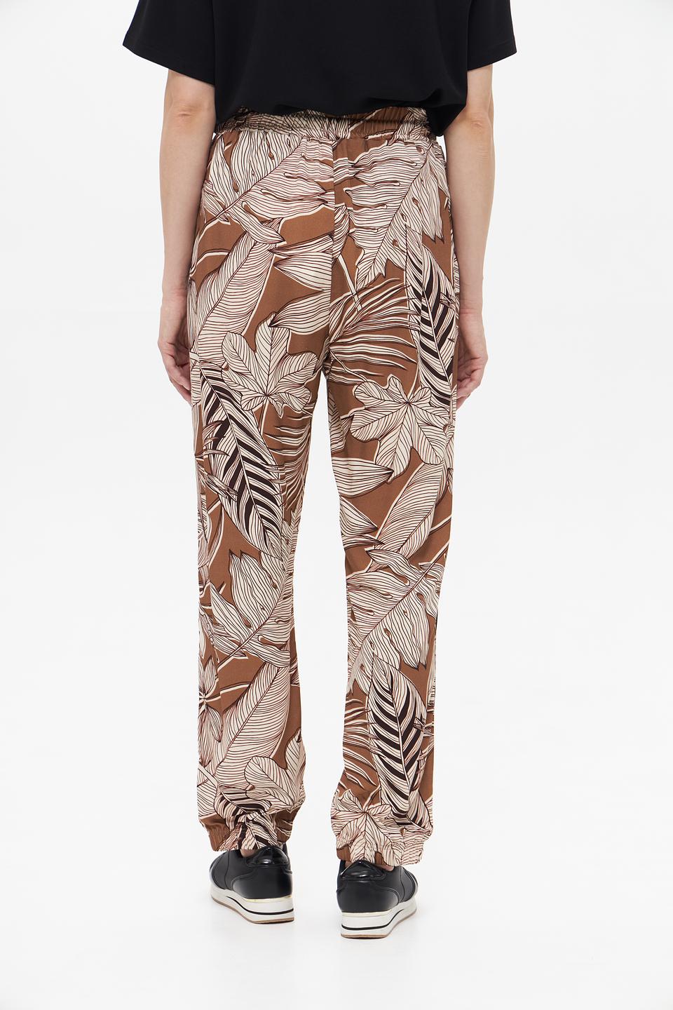 Брюки UNQ с принтом и полосками