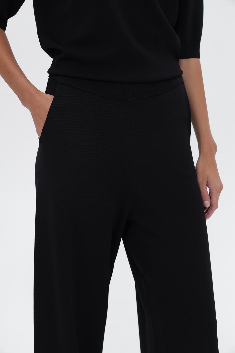Брюки UNQ палаццо черные